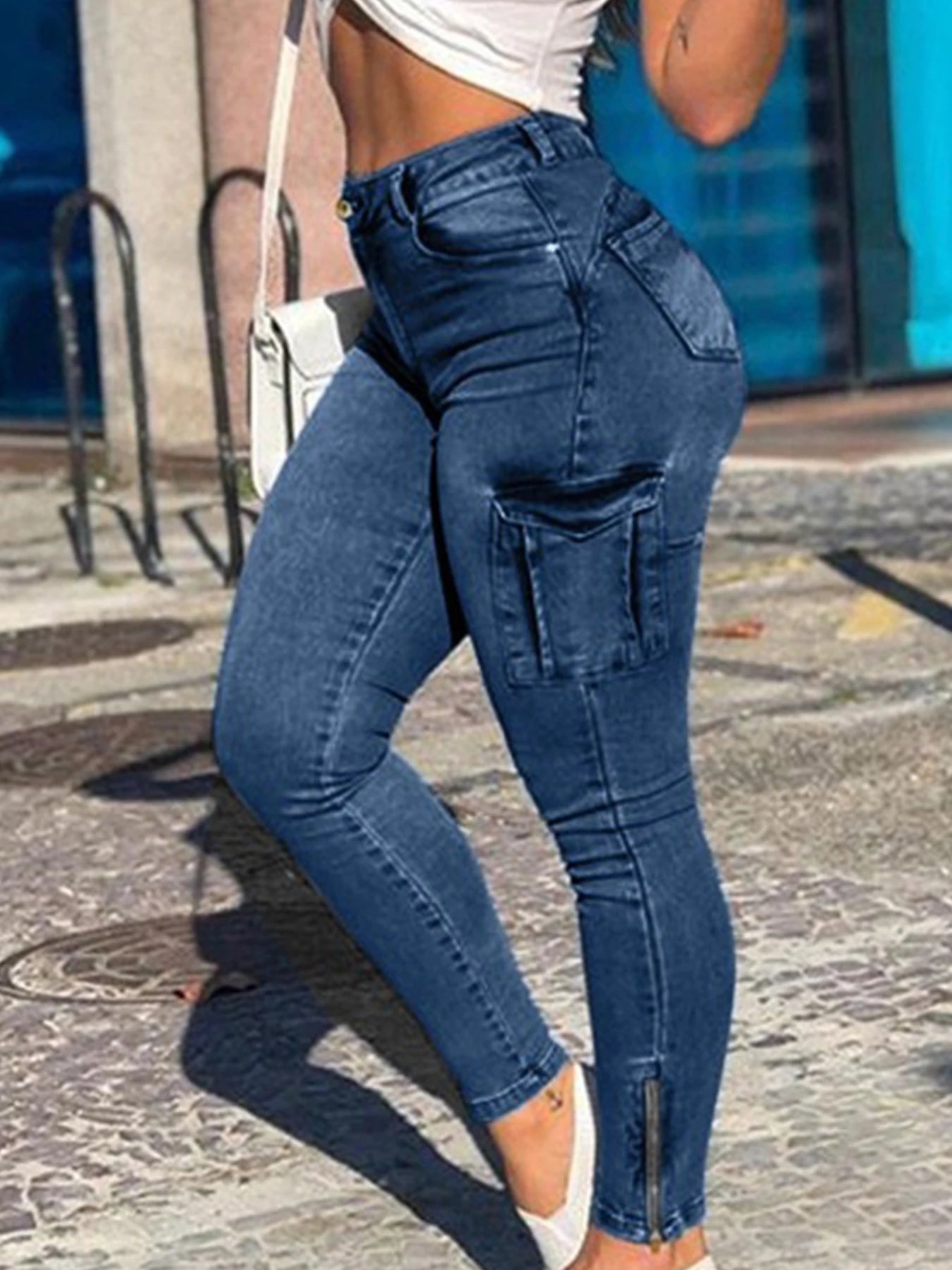 Women's elastic mid waist zipper hem tight jeans pencil pants, multi pocket fashionable casual denim work pants, suitable for al