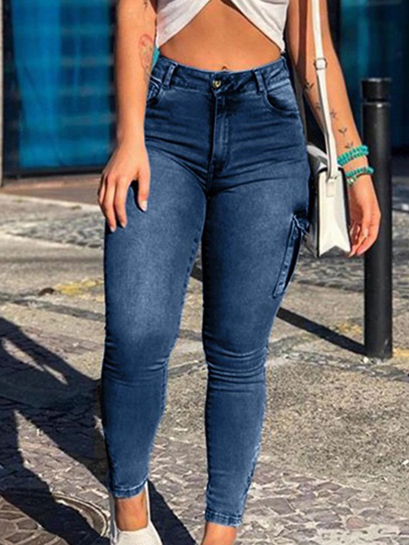 Women's elastic mid waist zipper hem tight jeans pencil pants, multi pocket fashionable casual denim work pants, suitable for al